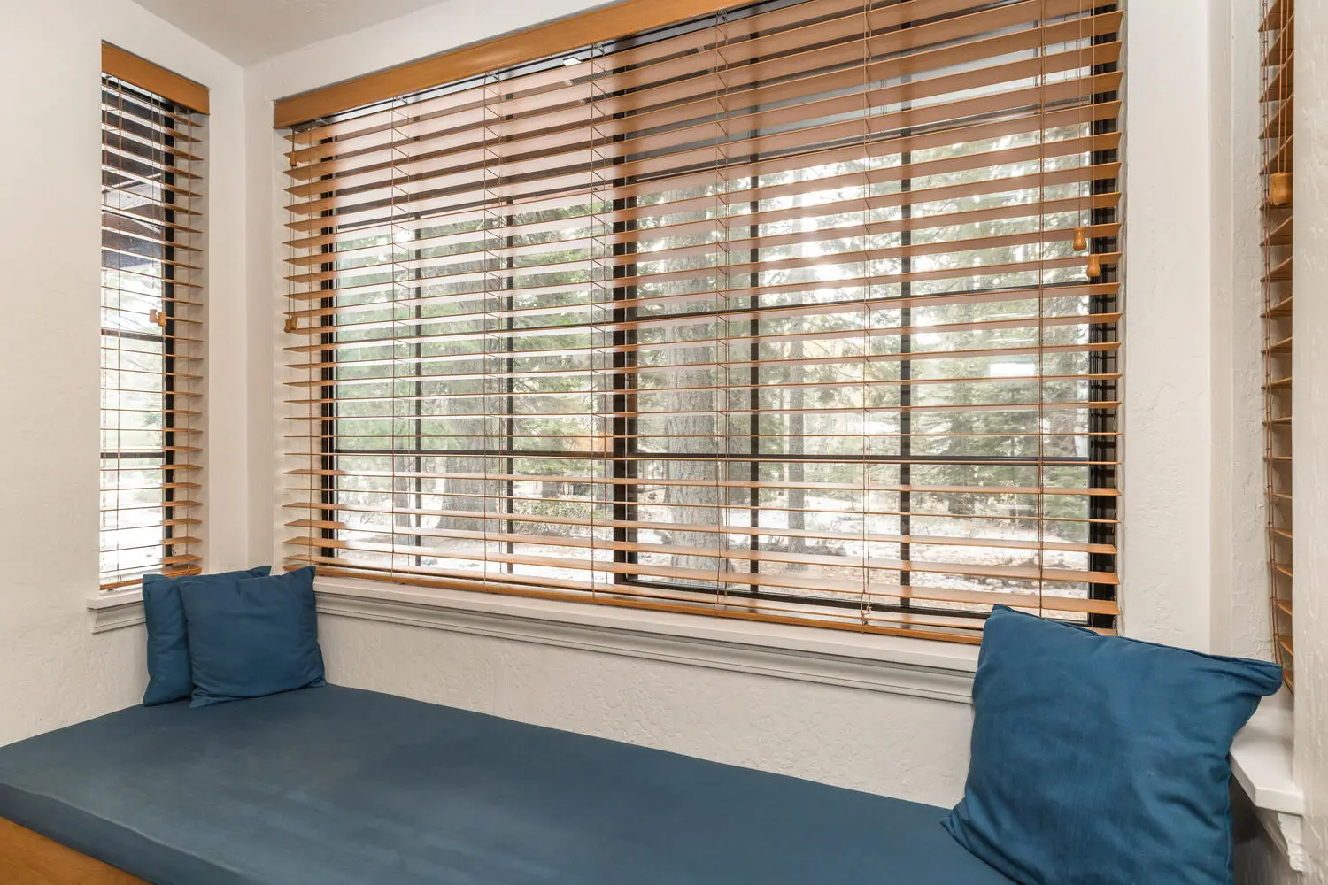 Window seat with cushions in a Deluxe Suite