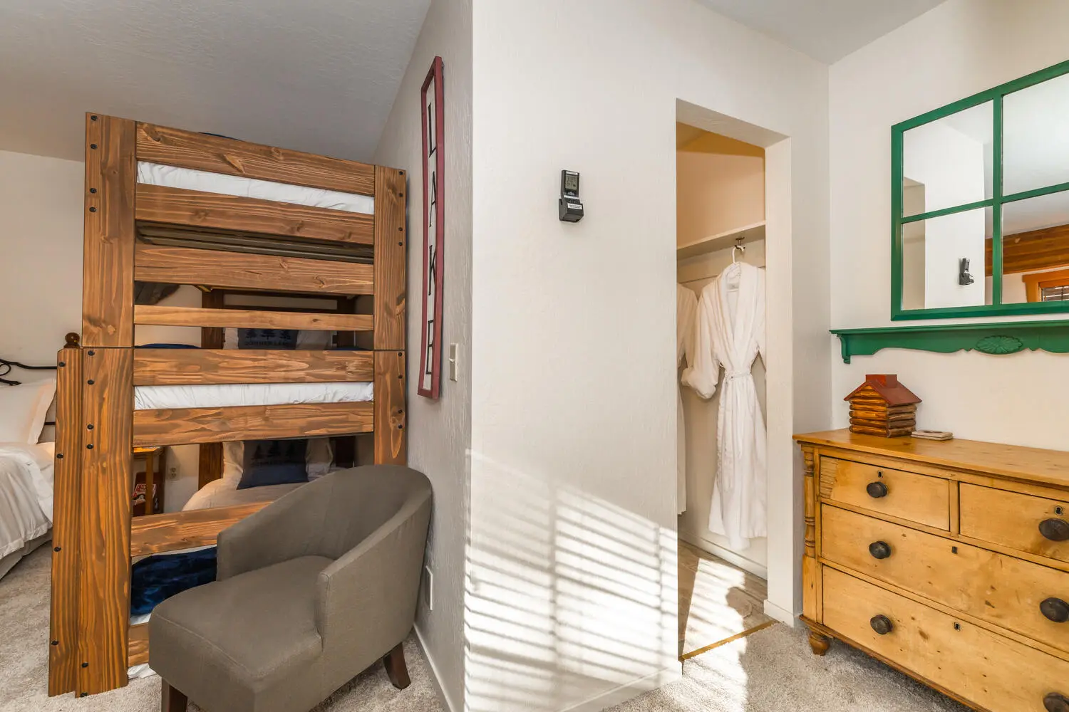 Closet with robes and mirror